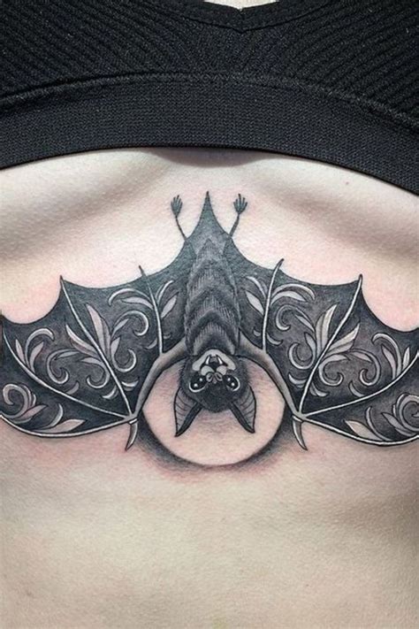 bat tattoo on neck|bat chest tattoo female.